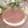 Elegant textured clear glass charger plate with gold rim.