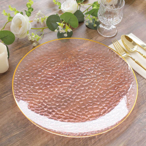 Elegant textured clear glass charger plate with gold rim.
