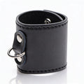rolled black faux leather ball stretcher with silver d-ring attachment and smooth stitched edges