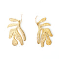 Texture Raw Brass Irregular shaped leaf earrings on brass hook.