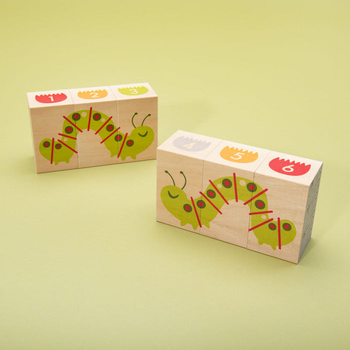 This floral frenzy is busting out with fun! Build your own garden scene. Six blocks feature tulips, colorful flowers, caterpillars, a butterfly, and more. Can you count the petals? How will you measure the inchworm with the ruler? More than colorful educational blocks, this artful set is a decorative puzzle, too. It’s blooming beautiful!  6 - 3 x 1.75 inch blocks