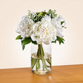 Peonies and Eucalyptus in Glass Vase